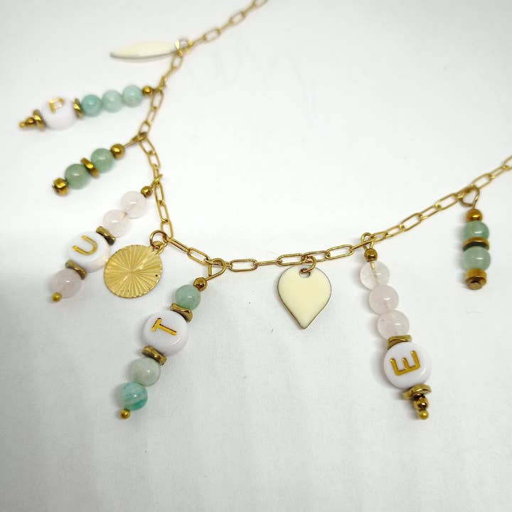 Bohemian necklace with “whore” message for wholesale by miss camille