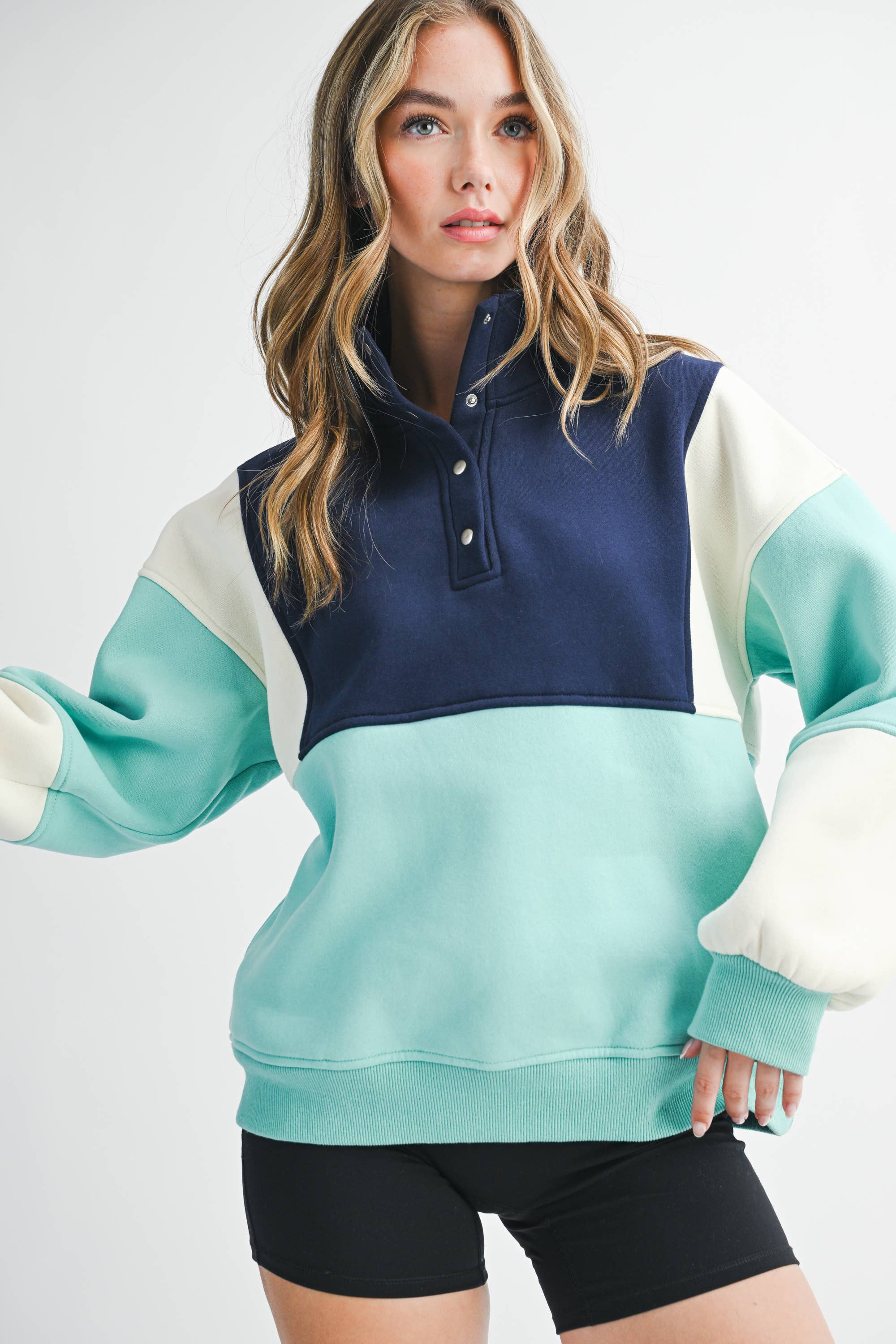 AEMI + CO – wholesale Sweatshirt - Dam – 992EK Glo colorblock-tröja med tryckknappar24