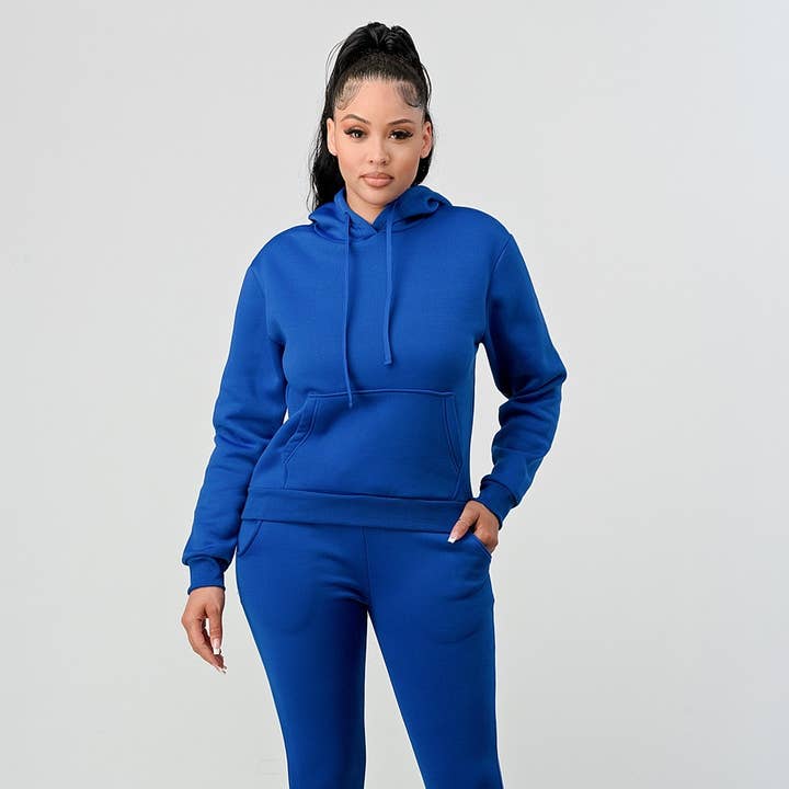 Solid Hoodie Jogger Set With Front Pocket and other Purchase Wholesale apparel sweatpants. Free Returns & Net 60 Terms on Faire trending on Faire.
