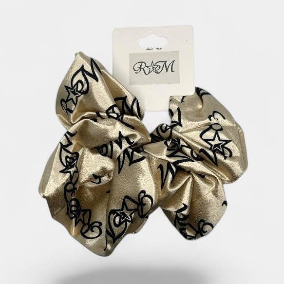ELEGANT LONG TASSEL SCRUNCHIE BOW for wholesale by RODOLFO MEDINA