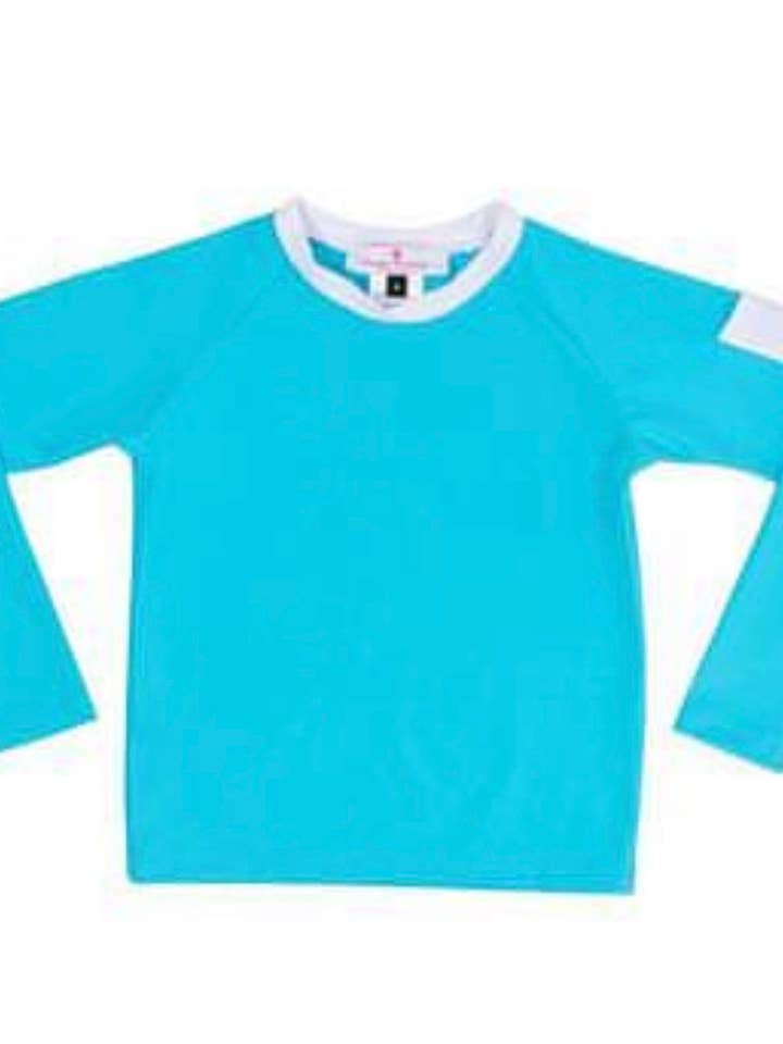 RASHGUARD ALEXANDER UPF50+ CELESTE per la vendita all'ingrosso da parte di Piccoli Principi Swimwear