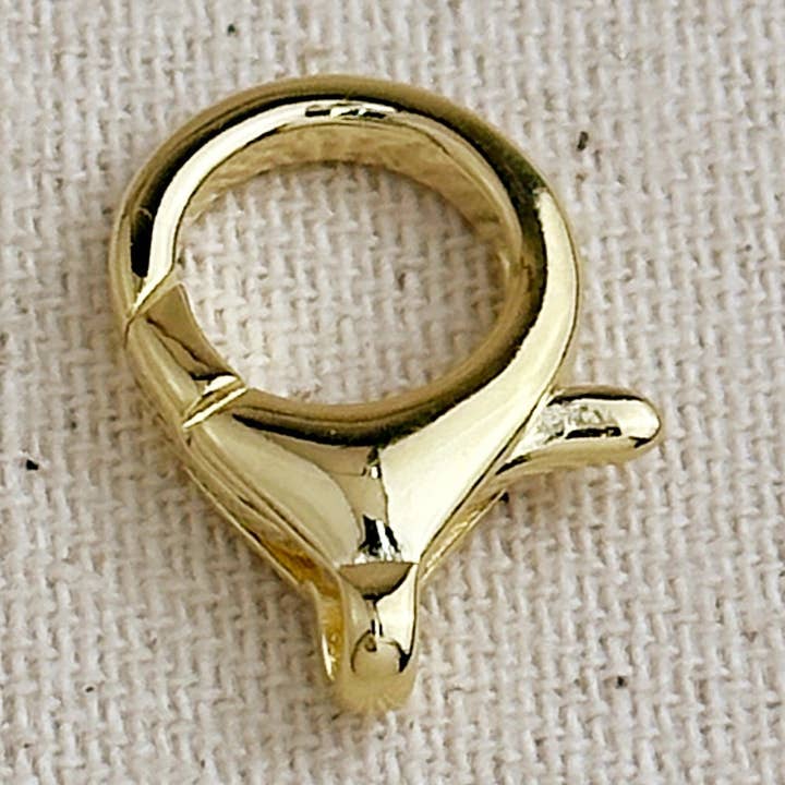 Chiusura a moschettone rotonda da 20 mm placcata in oro 18 carati per la vendita all'ingrosso da parte di GoldFi