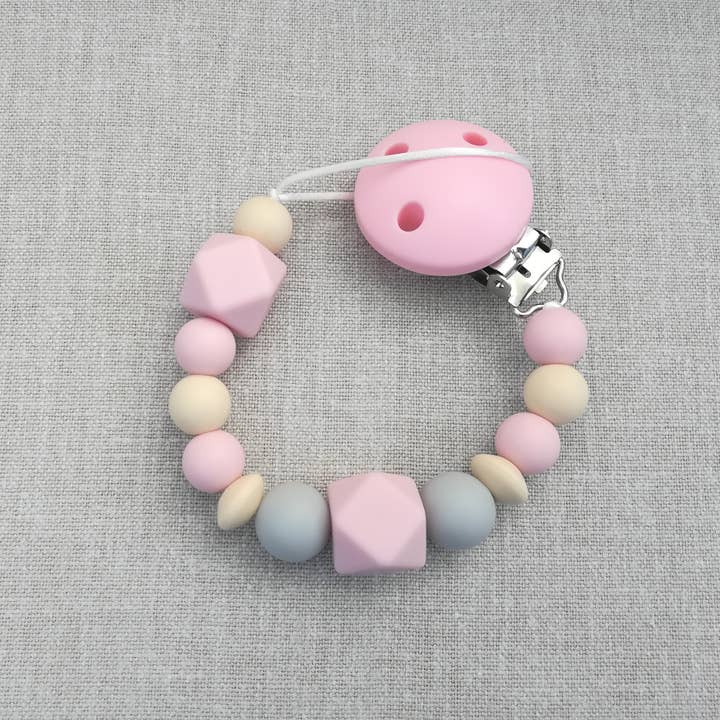 Attache-suce rose bébé pour la vente par Mordisquitos.