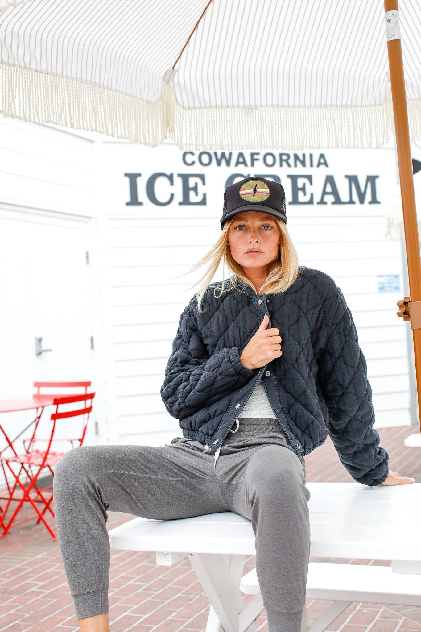 Electric Rainbow Trucker Hat in Black for wholesale on Faire8