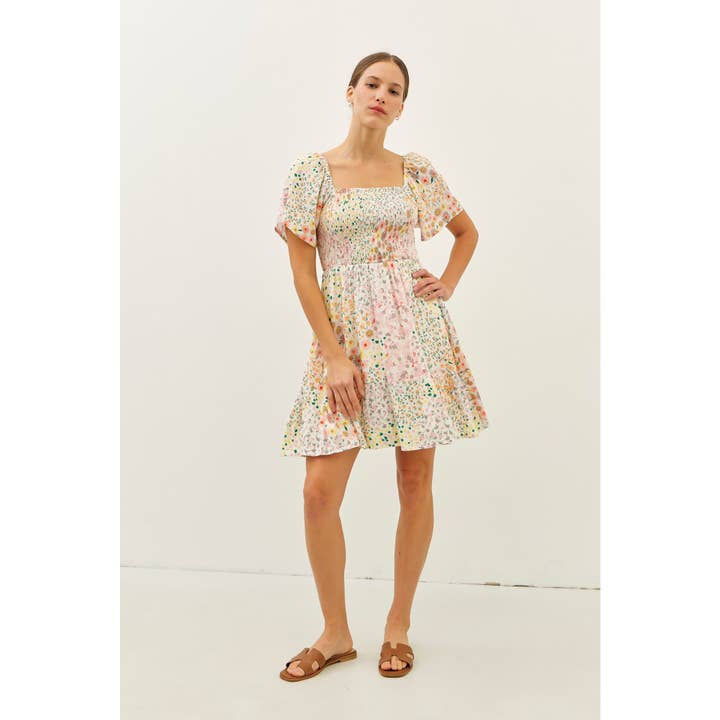FLOWY RAYON GAUZE SMOCKED DITSY FLORAL MINI DRESS for wholesale on Faire