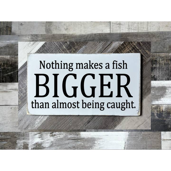 NOTHING MAKES A FISH BIGGER THAN ALMOST BEING CATCH -DAD for wholesale by Dudley's Cottage & Gifts