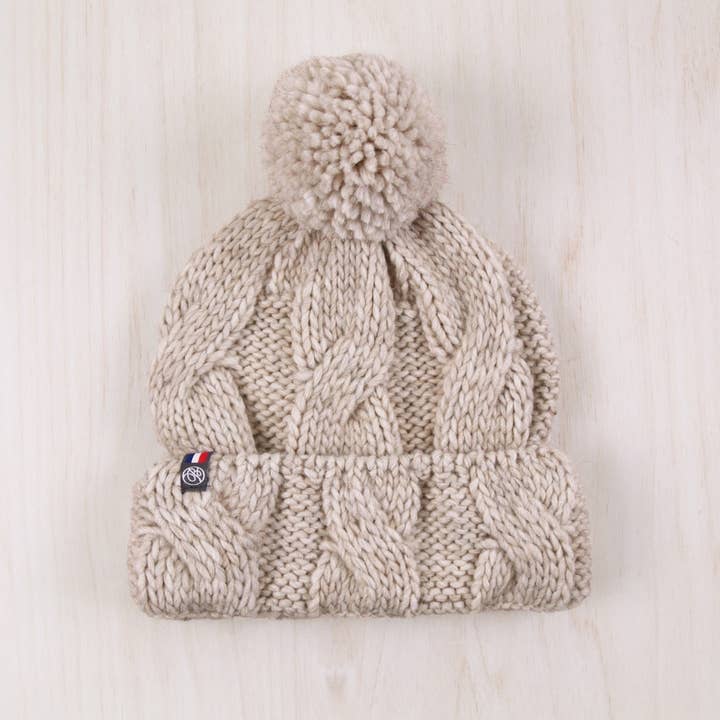 Cyrielle beanie with pompom and other Purchase wholesale red and white pom poms. Free returns & net 60 terms on Faire trending on Faire.