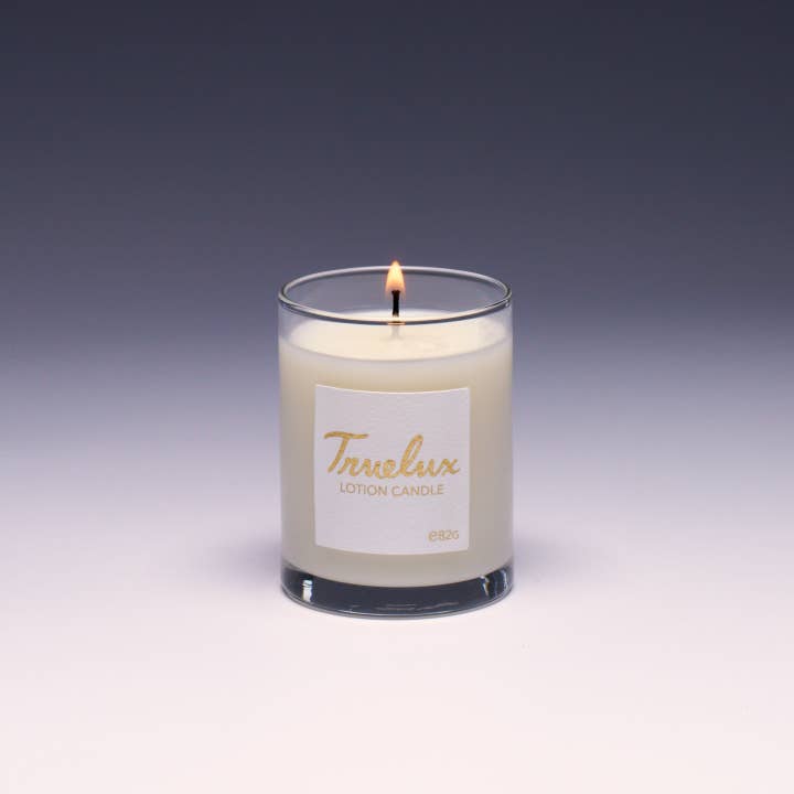Mini Sanctuary Soy Lotion Candle (Exotic Wood + Smoky Earth) for wholesale by Truelux
