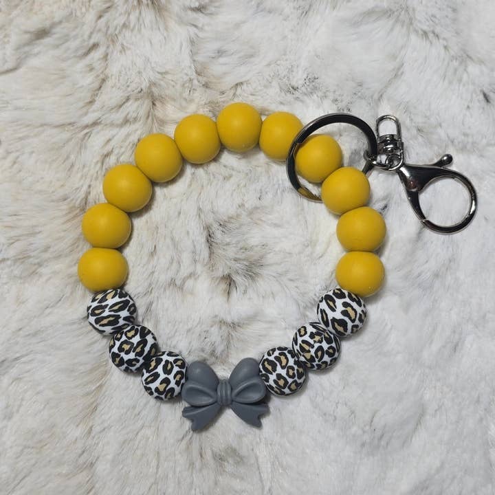 Grey Bow Beaded Wristlet for wholesale by Lush Designs