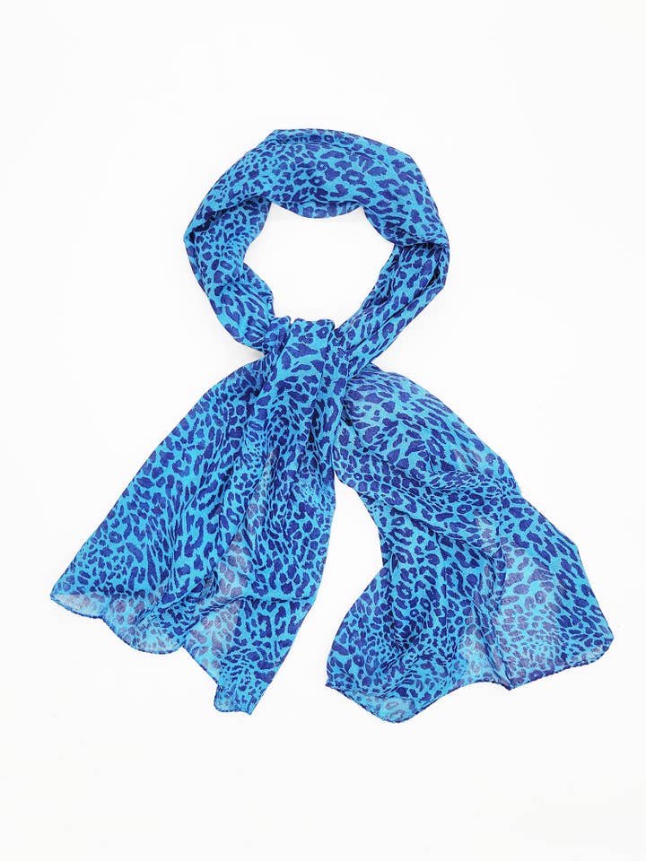 Sheli Assorted Leopard Printed Oblong Scarf for wholesale by Raj Trading & Imports (USA) Inc.
