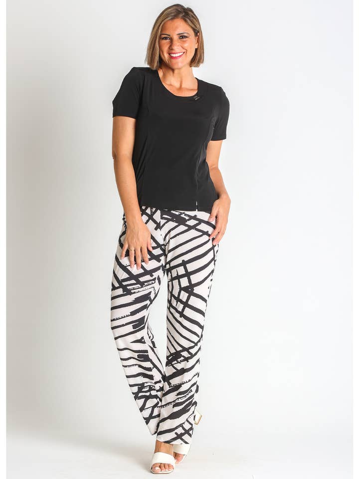 368612L GENANVENDTE TRYKTE STRIKKEDE BUKSER for engroshandel hos LOURDES CASTILLO