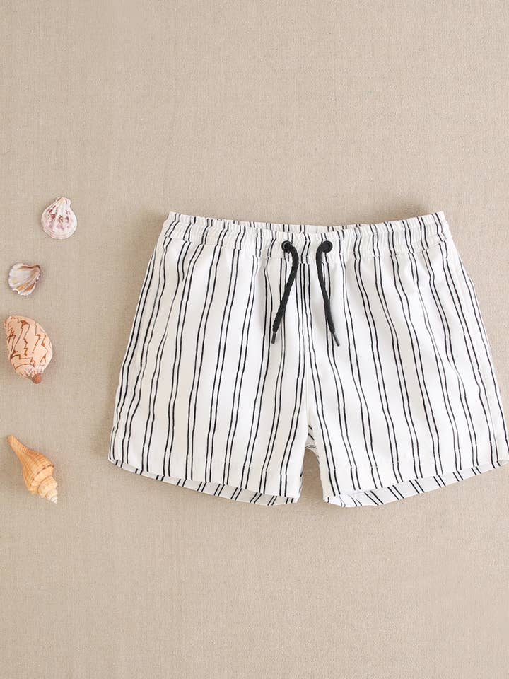Witte kinderzwembroek met zwarte strepen voor wholesale door Dadati