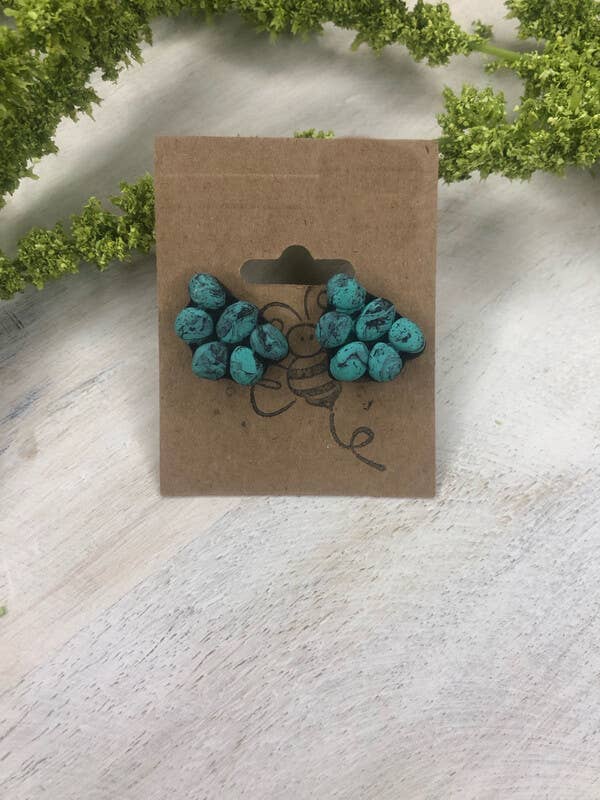 Borchie Concho turchesi e nere per la vendita all'ingrosso da parte di Buzzy bee clay