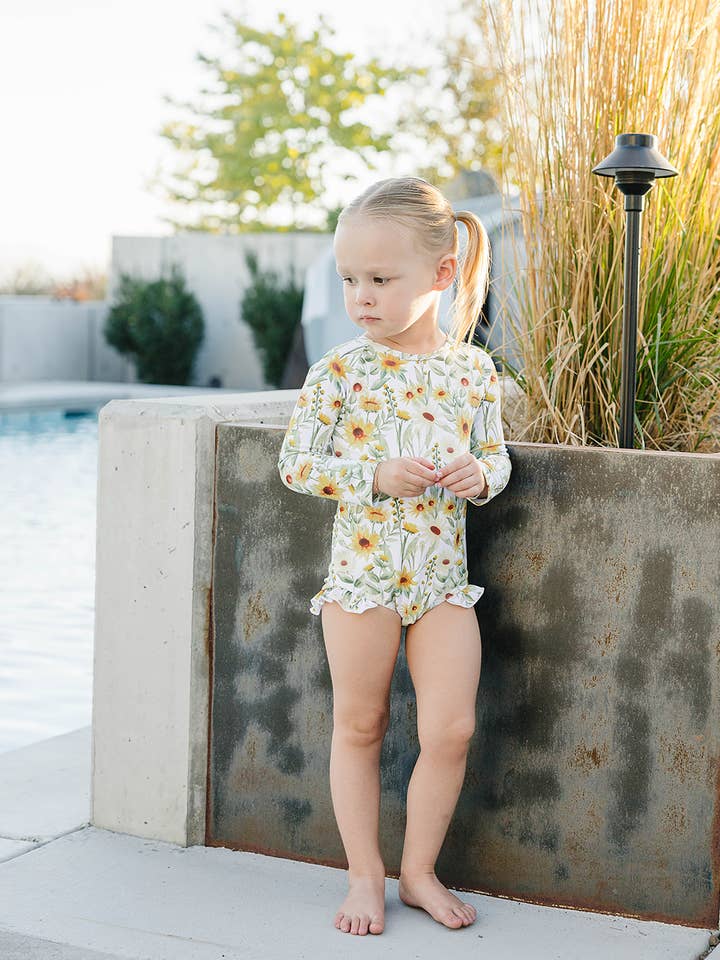 The "Brooklyn" Ruffle Rashguard Suit for wholesale by Current Tyed Clothing