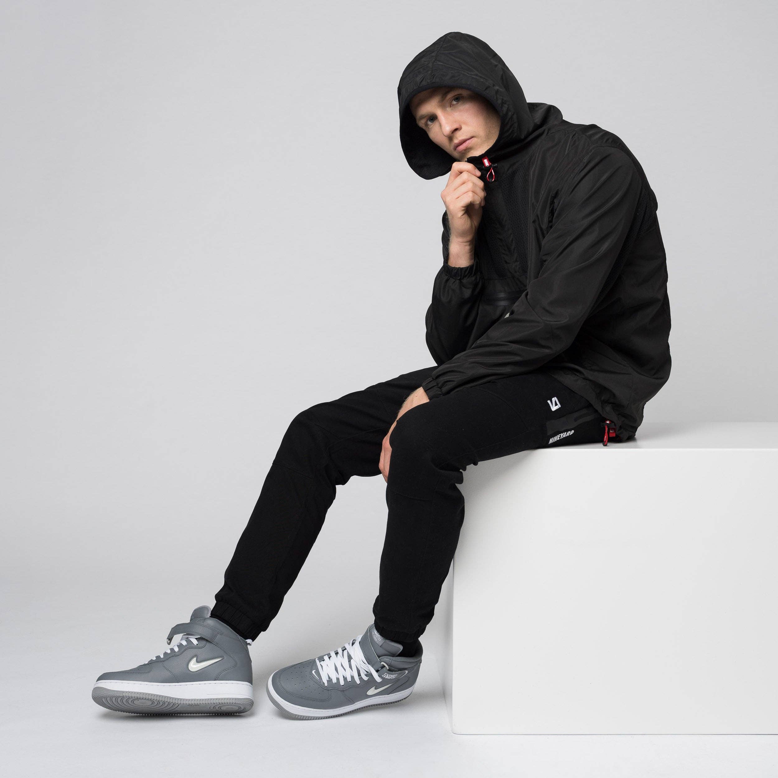 black SIGNATURE. vent half zip windbreaker jacket for wholesale on Faire6