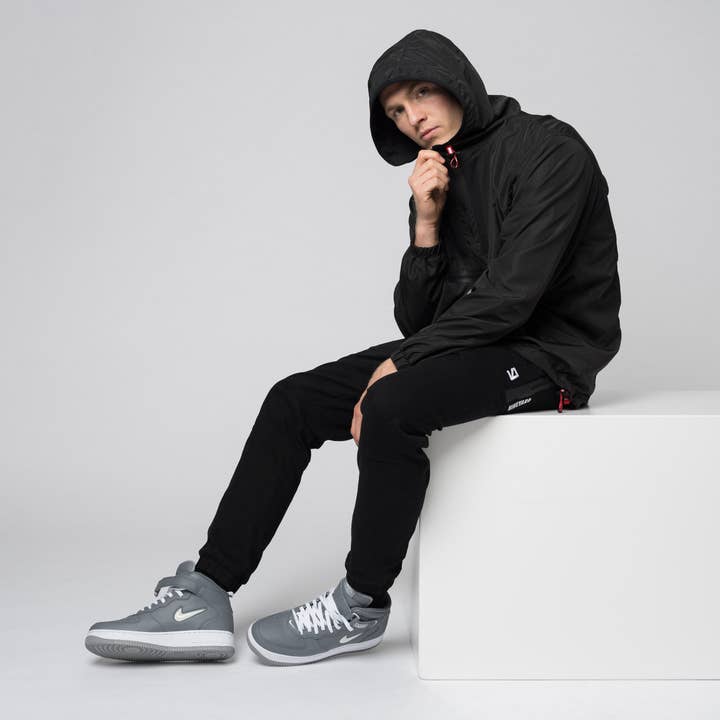 black SIGNATURE. vent half zip windbreaker jacket for wholesale on Faire6