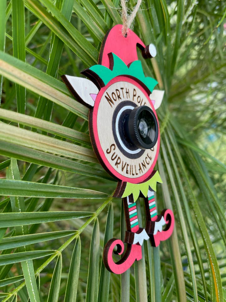 North Pole Surveillance Funny Ornament for wholesale by BUBBLEHEAD INK