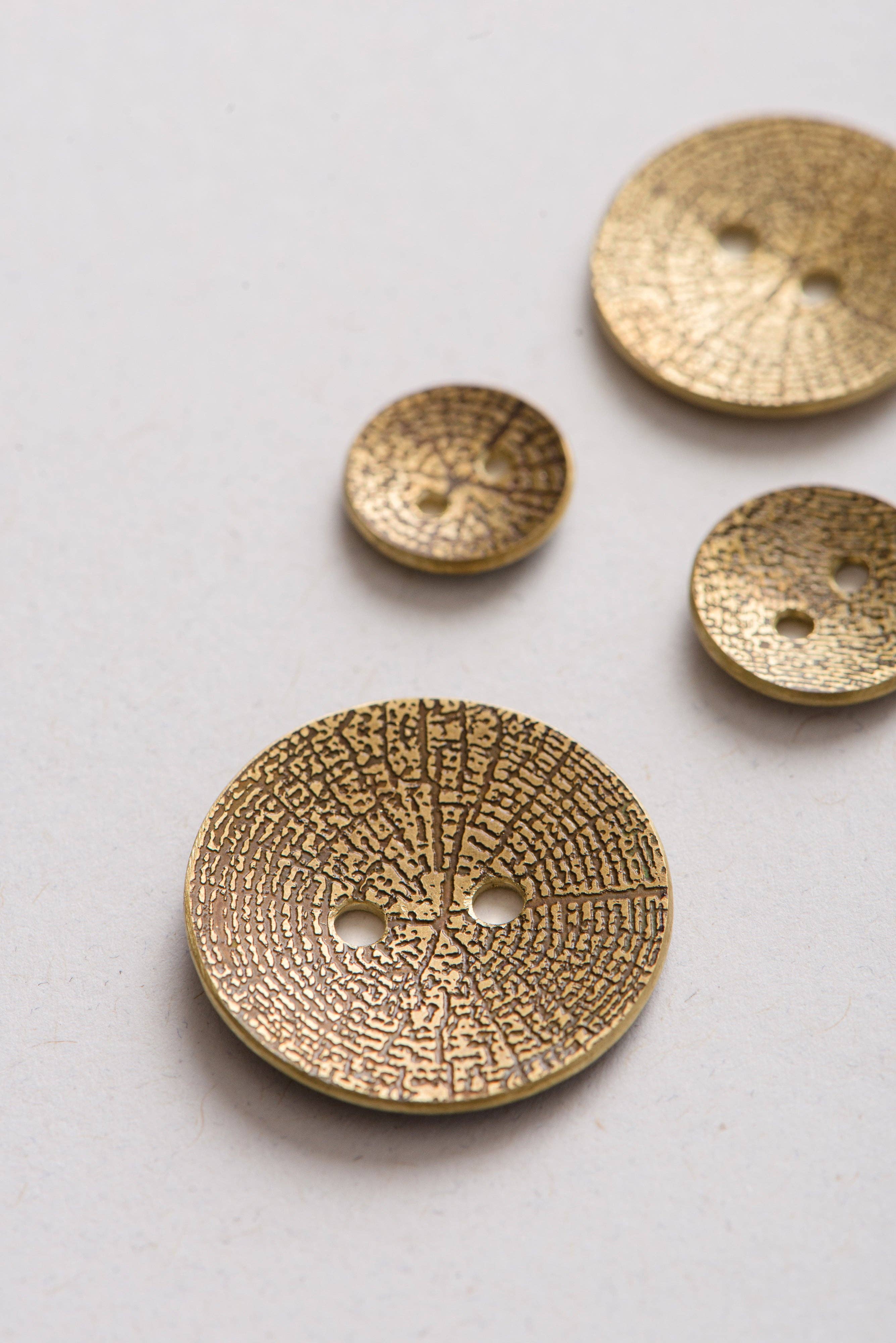 Quince & Co. - Wholesale Sewing Button/Snap - woodgrain brass buttons1