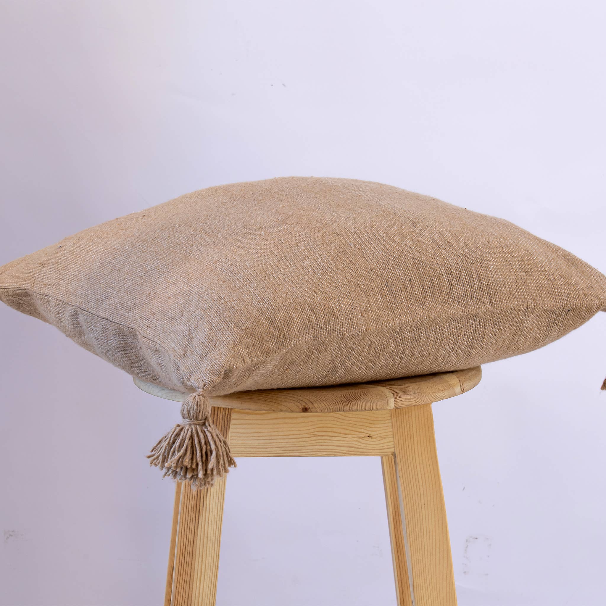 woolsouk ( We handle U.S. import procedures for you ) – wholesale Throw/decorative pillow – Handwoven Moroccan Wool Cushion with Pom Poms -Light Beige1