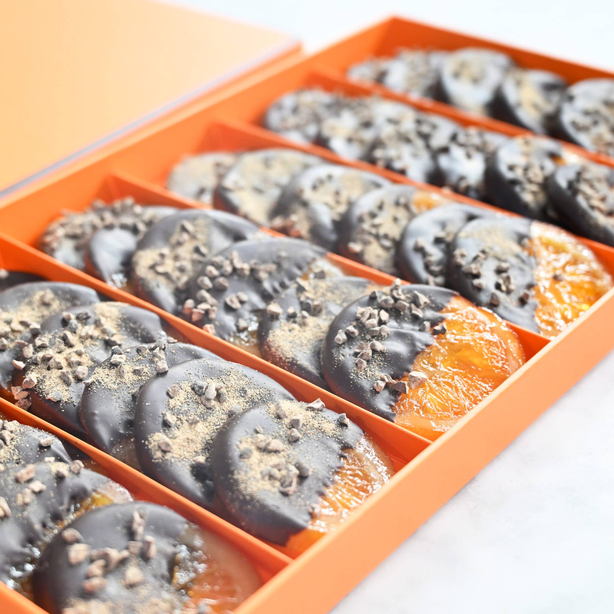 Melt Chocolates – Großhandel Süßigkeiten mit Schokoglasur – Große Orangenscheiben-Geschenkbox – in Zartbitterschokolade getaucht1