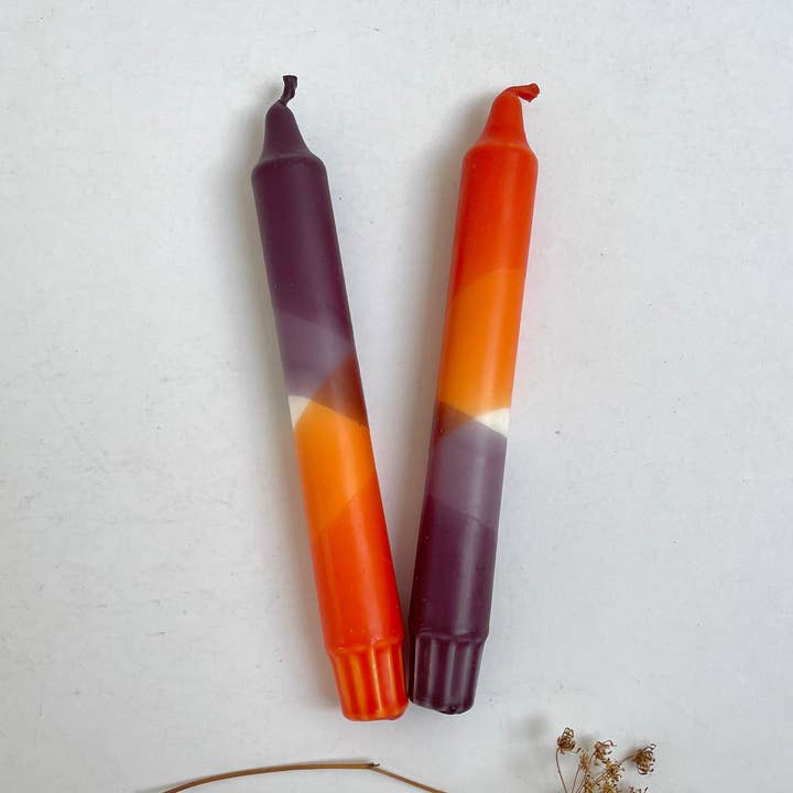 Rust Red and Aubergine Dip Dyed Dinner Candles for wholesale by The Singing Rabbit