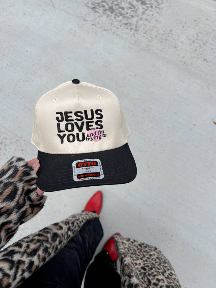 Jesus Loves You And I'm Trying To Black/Natural Embroidered for wholesale by Ruby Moon