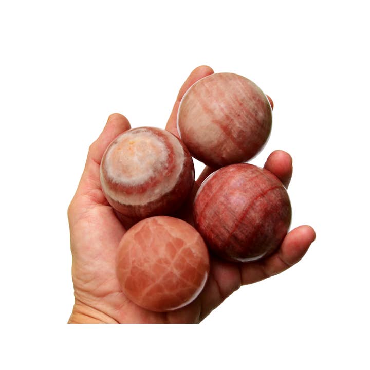 Rose Calcite Sphere Crystal (50mm - 60mm) for wholesale by Kaia & Crystals