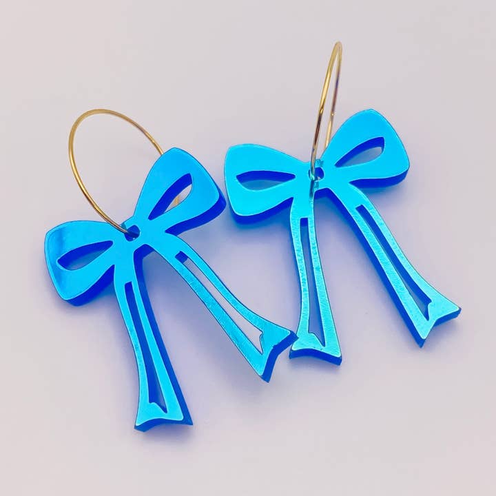 BOWS ON A HOOP EARRINGS BLUE HOLOGRAPHIC for wholesale by Sandy Lou Designs