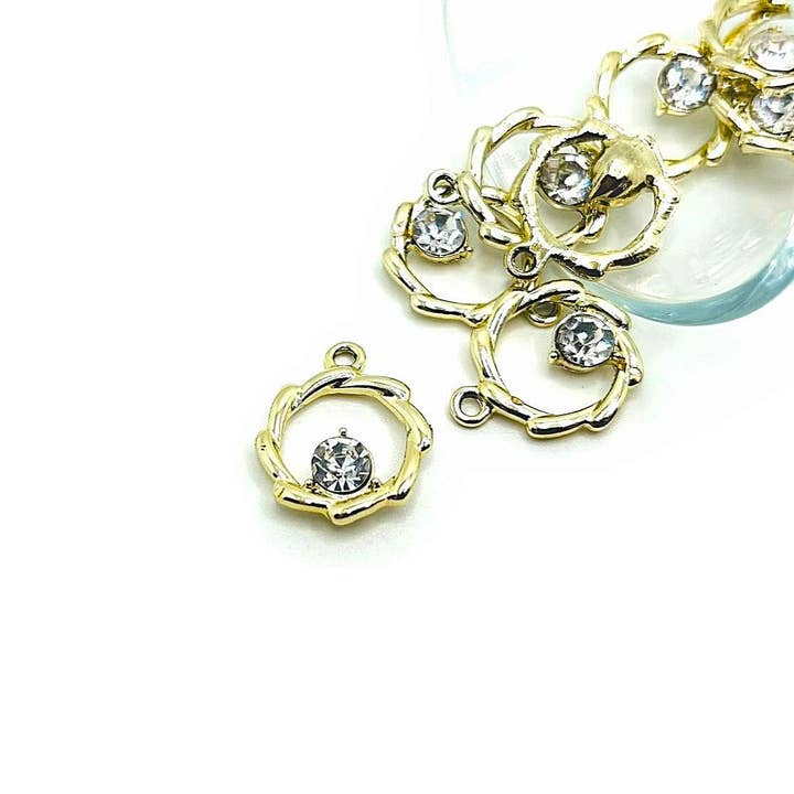 Gold Toned Round Pendant with Rhinestone Charms, 17x21mm for wholesale by Guerrilla Charm