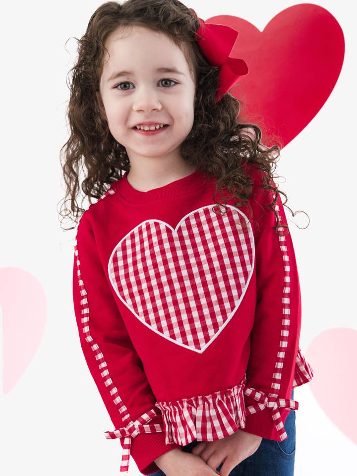 Girls Heart Red Gingham Applique Ruffle Bow Sweatshirt
for wholesale by RuffleButts + RuggedButts