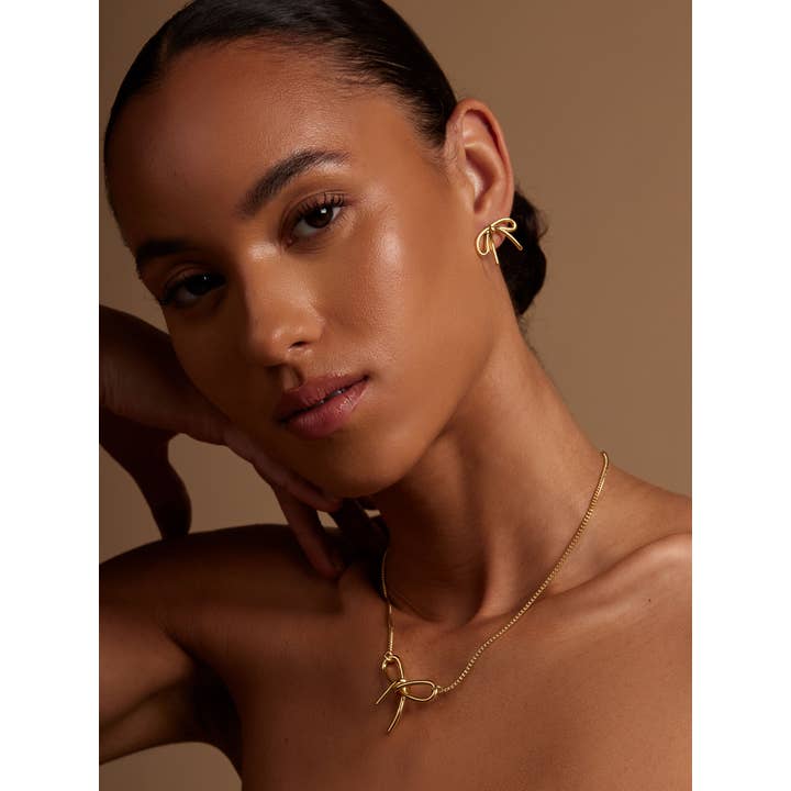 rho - Wholesale Stud/Post Earrings - Small Bow Stud Earring1