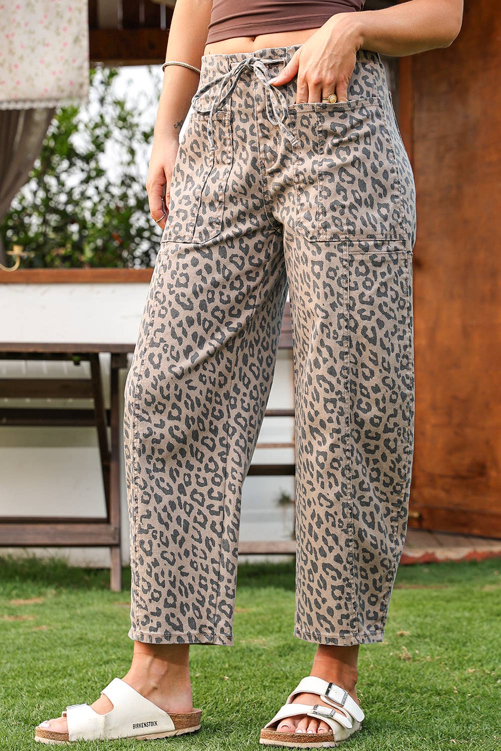 As shown Fashion-W Leopard Drawstring Waist Pocketed Wide Leg Jeans for wholesale on Faire8