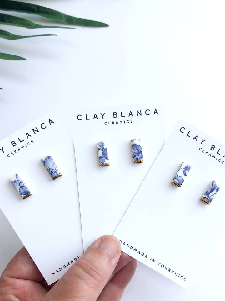 Blue China Set - Stud and Dangle earrings with gold tips for wholesale by Clay Blanca