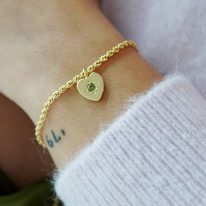 Peridot Heart Charm Rope Bracelet for wholesale by Junk Jewels Ltd