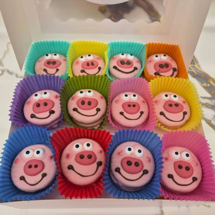 Pig Oreo's Hand Decorated, box of 24 for wholesale by Bear Creek Candy Kitchen