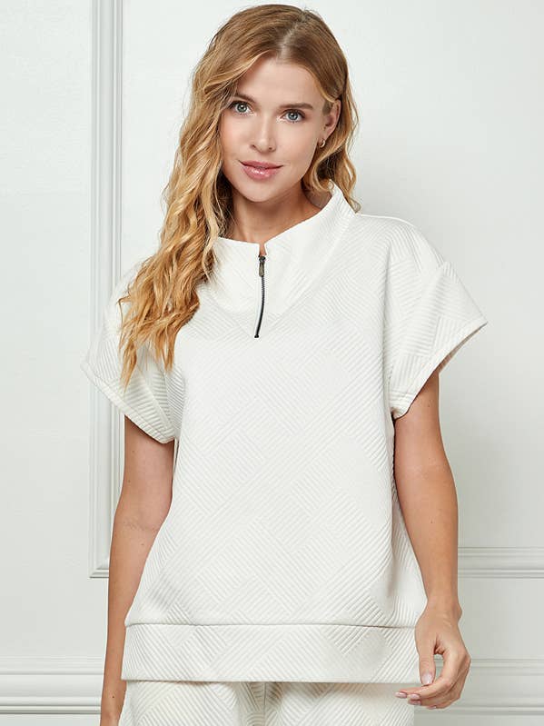 T3705 half-zip textured top with cap sleeves. for wholesale by See and Be Seen