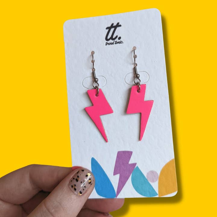 Mini neon pink cork lightning bolt earrings for wholesale by Trend Tonic Ltd