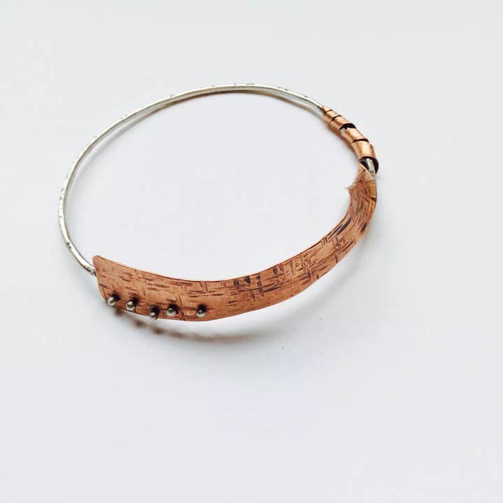 Rivet Twist Bangle for wholesale by JL Merrill Metalworks