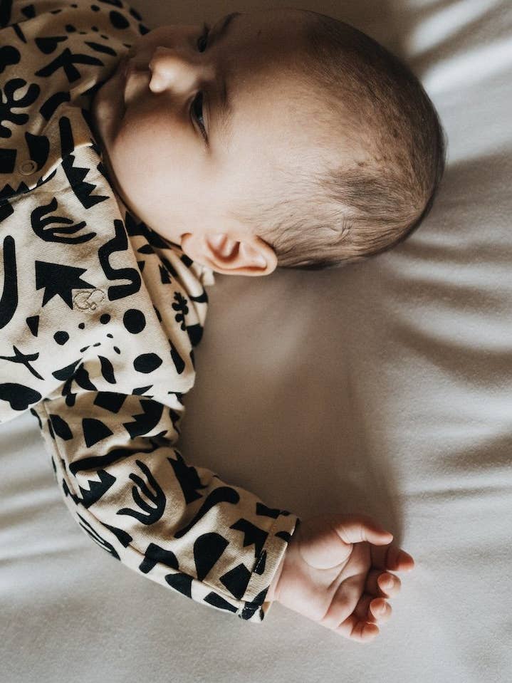 Geometric baby jumpsuit 100% organic cotton for wholesale on Faire4