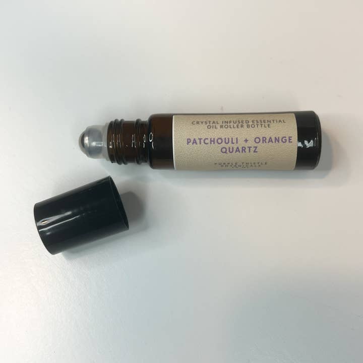 Purple Thistle Botanicals - Wholesale Essential oil roll-on - Patchouli + Orange Quartz Crystal Infused EO Roller Bottle0