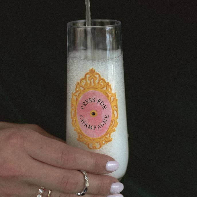 Press For Champagne 9oz Flute Tossware for wholesale by Sip Hip Hooray