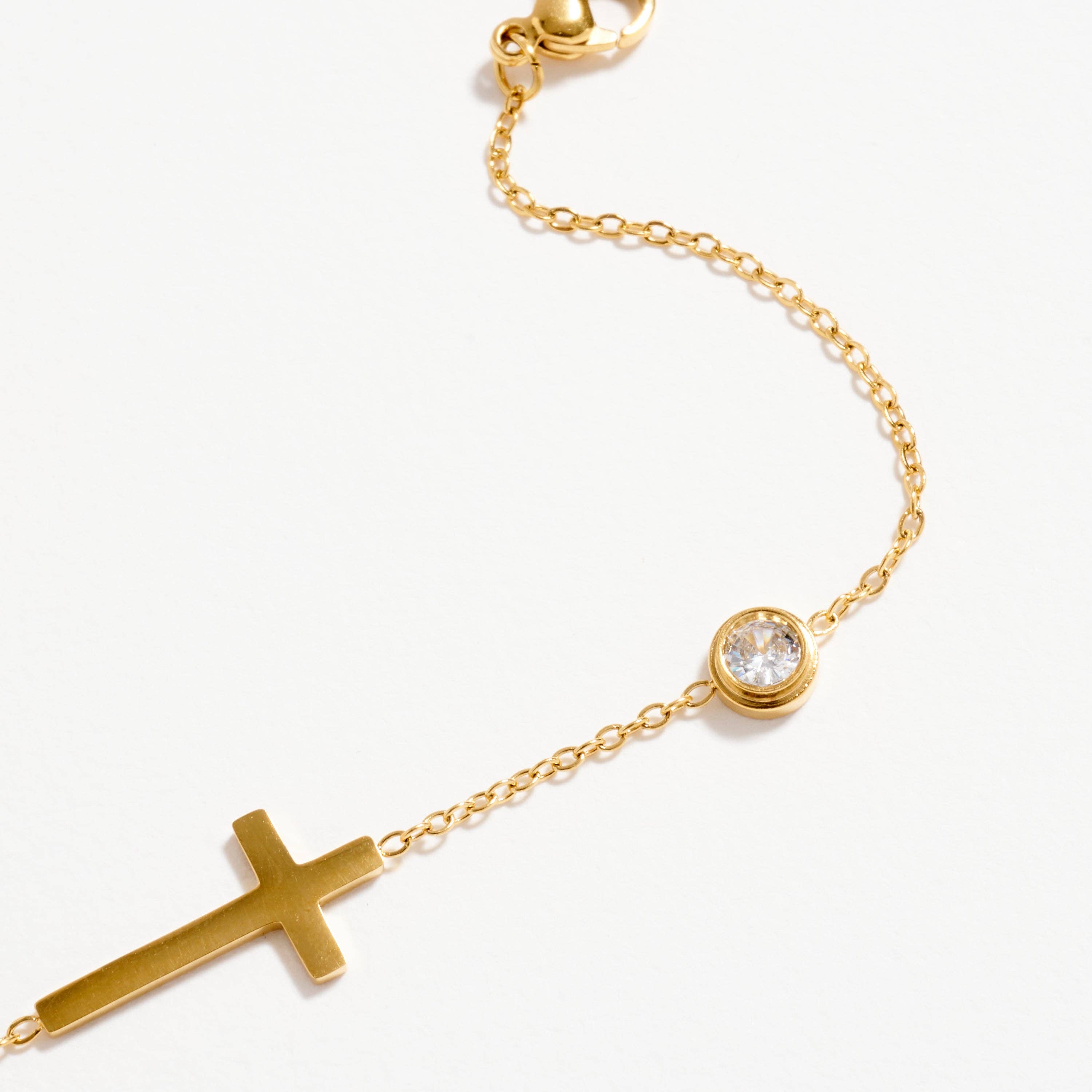 GD Gold-Tone Cross Bracelet with CZ Accent – Dainty Adjustable Faith Bracelet for wholesale on Faire1