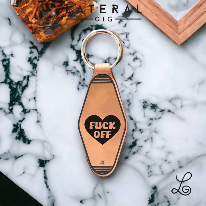 Flip Off Leather Keychain for wholesale by Lateral Gig
