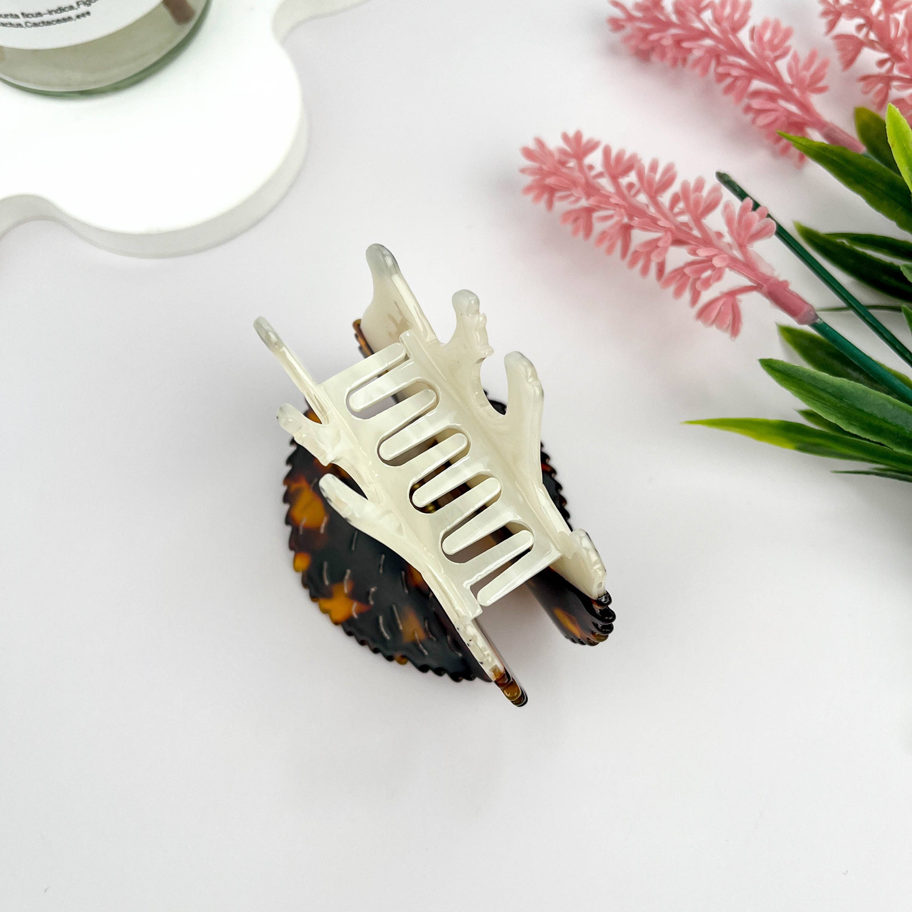 Bruin Stekelige egel haarklem van acetate voor groothandel op Faire2