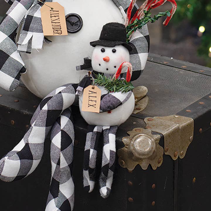 The Hearthside Collection - Wholesale Kerstdecoratie - Alex sneeuwpop met buffelruitjes, zwart/wit