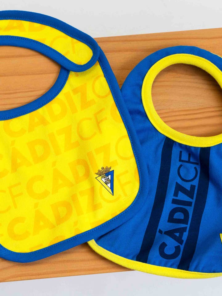 Pack baberos de bebé - Cádiz CF para venta al por mayor de Charanga
