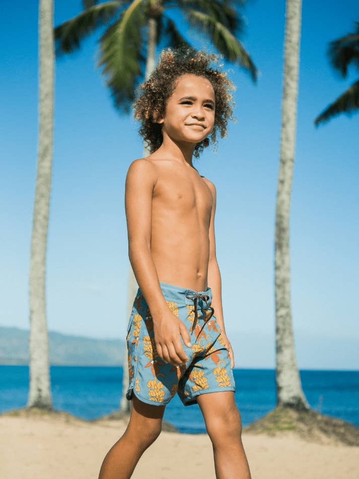 Kid’s Retro Boardshorts in Banana Flower for wholesale by Of One Sea