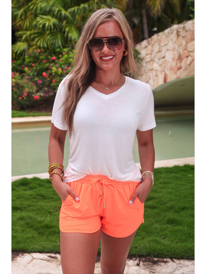 Solid Neon Coral Everyday Shorts for wholesale on Faire2