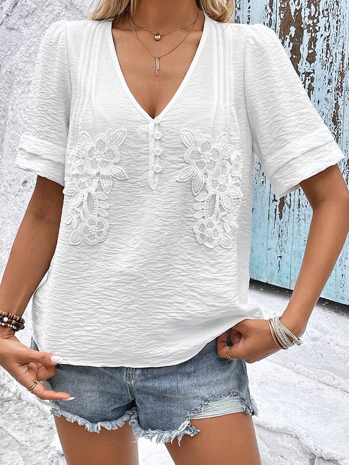 Blommig blus med djup urringning för wholesale av Mccolin