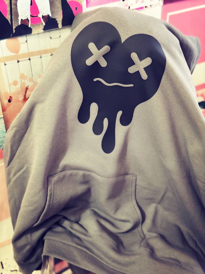 Tired Heart Hoodie – Cozy Pullover in Blue, Gray, or Black with Bold Heart Graphic for wholesale by The Maximalist Boutique